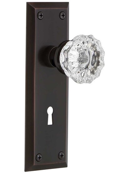 New York Style Door Set With Fluted Crystal Glass Door Knobs in Timeless Bronze.